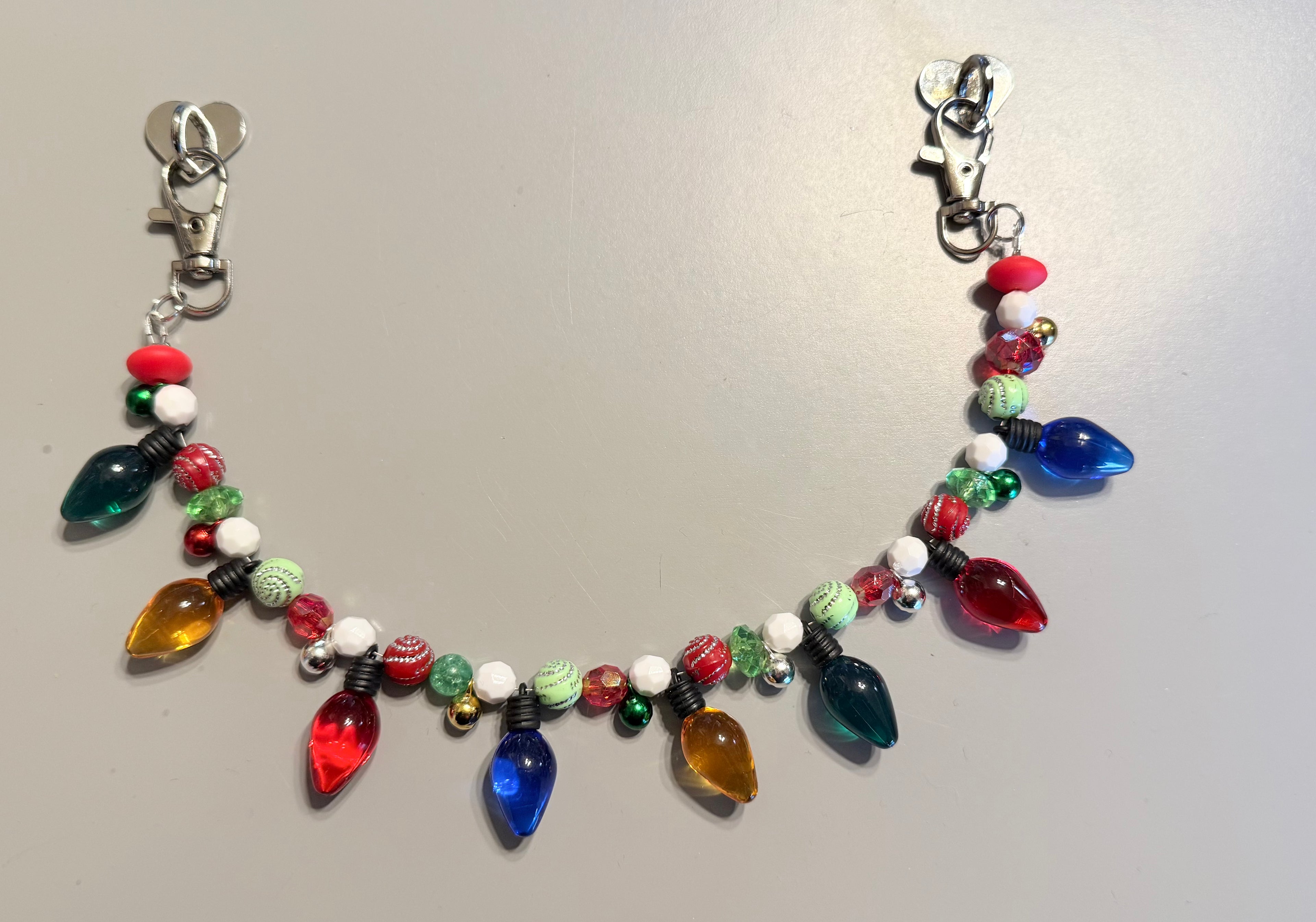 Deck the halls. Cup or purse charm